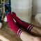 Бордові шкарпетки з чорно-білими смужками
