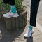 Бірюзові шкарпетки з білими смужками