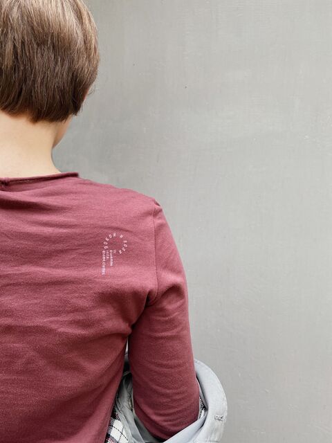 Burgundy longsleeve Snow is falling