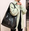 Black shopper bag with lining and a single handle