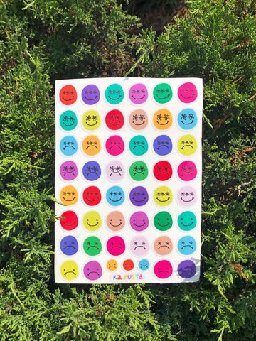 A sheet of transparent stickers Faces