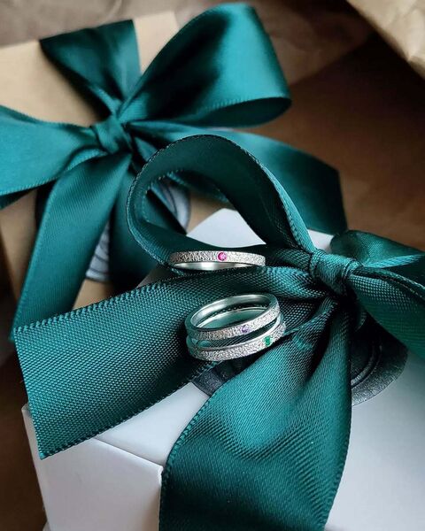 Textured ring with green cubic zirconia