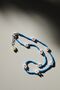 Голубое ожерелье с ромашками