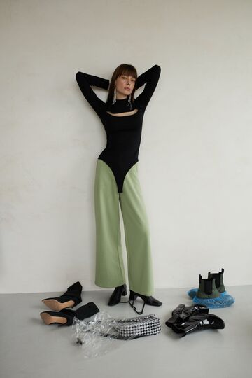 Black bodysuit with a slit on the chest