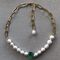 A necklace of pearls and aqua quartz