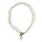 A pearl necklace with a gold-plated clasp