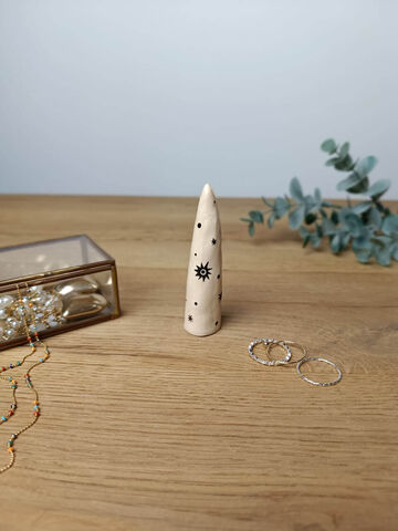 Beige small cone for rings with a painting of Stars