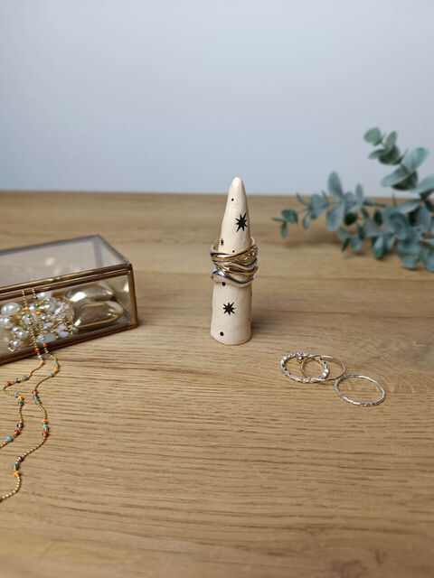 Beige small cone for rings with a painting of Stars