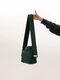 Green shopper with a stable handle