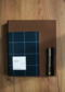 Blue checkered notebook with dots