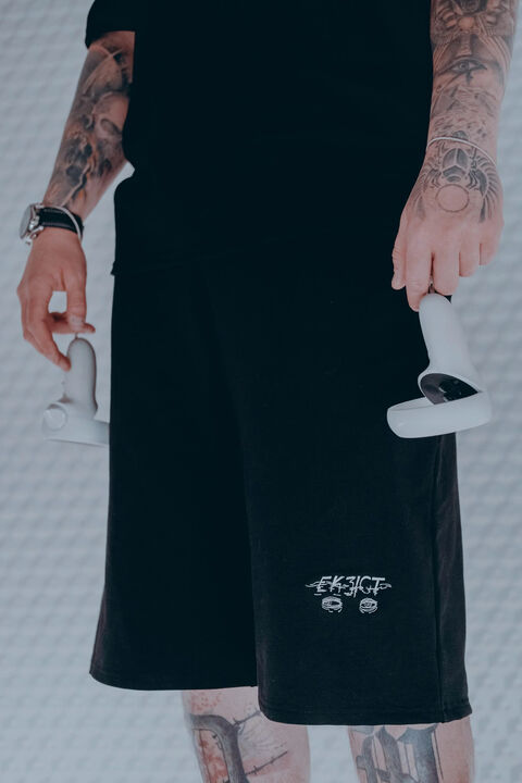 Black shorts with embroidery Exist