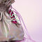 Beige gray holographic bag with pink rope