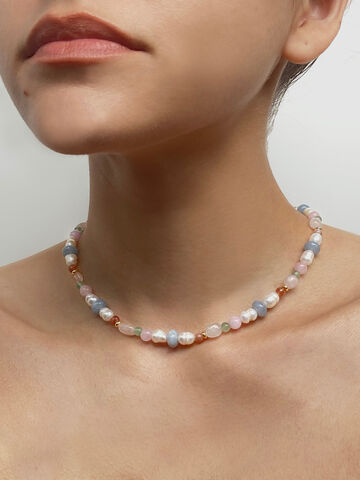 A necklace of pearls and colored stones