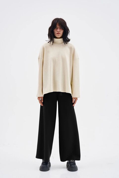 Чорні подовжені штани на запах Right to life