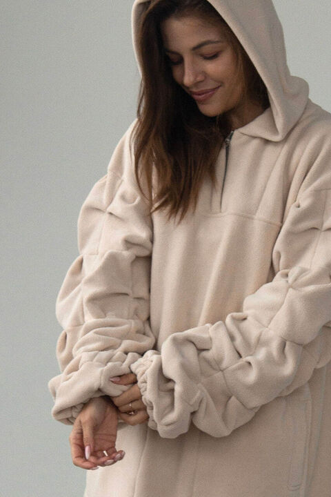 Beige fleece hoodie with puffy sleeves