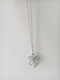 Silver flower from round beads on a chain