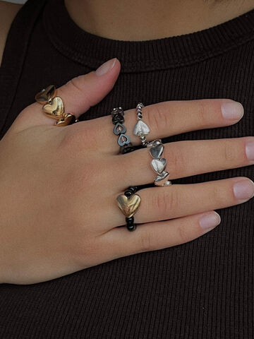 Silver ring with one heart