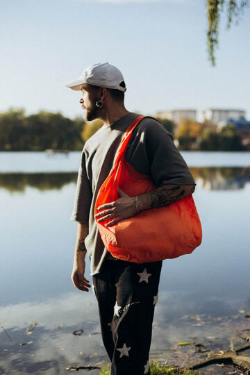 Orange shopper made of recycled plastic bottles