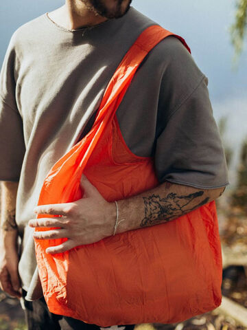 Orange shopper made of recycled plastic bottles