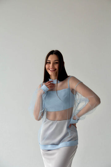 Блакитна блуза із сітки