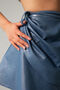 Denim skirt with metallic coating
