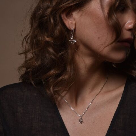 Кулон Навсібіч