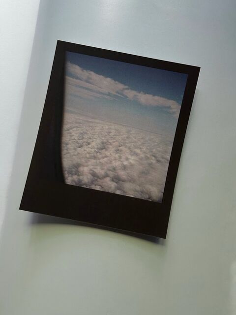 Postcard: Porthole and Clouds