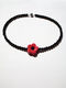 Daisy choker with a red flower