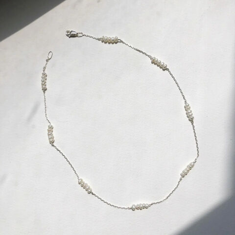 Beaded necklace with silver beads