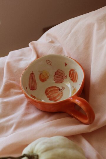 Cup with pumpkins