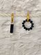 Asymmetric earrings with black stone and a pearl