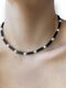 Choker with black stones and pearls