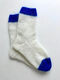 Hand-knitted socks made of natural wool beige with electric blue