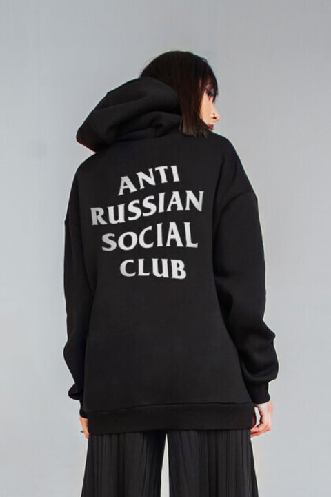 Black oversized ARSC hoodie with a white logo on the back