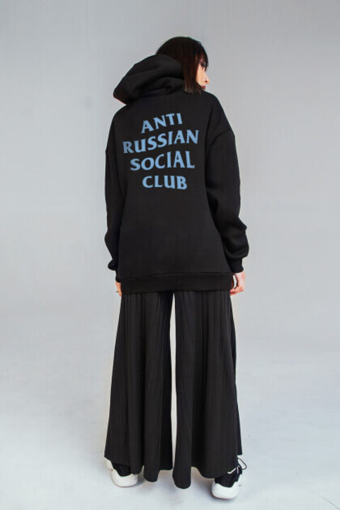 ARSC black oversized hoodie featuring a light blue back logo