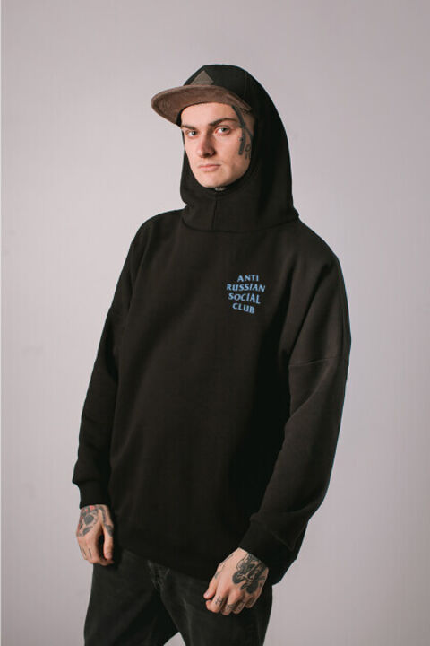 ARSC black oversized hoodie featuring a light blue back logo