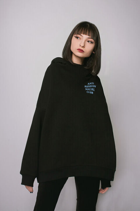 ARSC black oversized hoodie featuring a light blue back logo