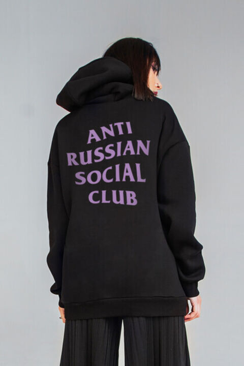 ARSC black oversized hoodie featuring a lavender back logo