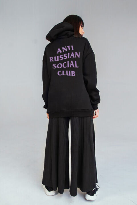 ARSC black oversized hoodie featuring a lavender back logo