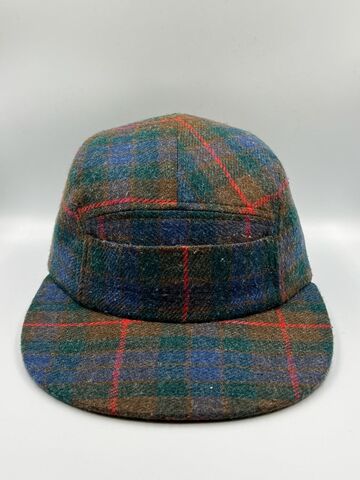 Dark blue checkered cap with a pocket