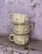 Polka dot mug with gold accents