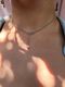 "Chopard" choker with a pearl and carabiner