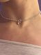 "Chopard" choker with a pearl and carabiner