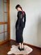 Long black dress with sheer inserts