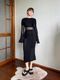 Long black dress with sheer inserts