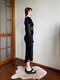 Long black dress with sheer inserts