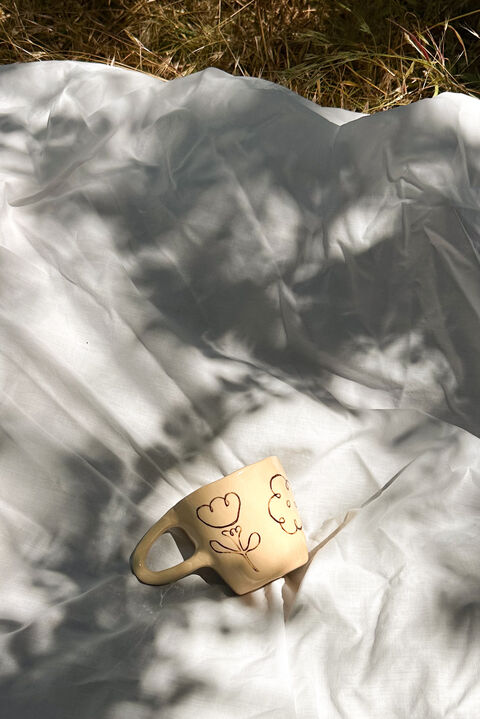 Чашка з квітками