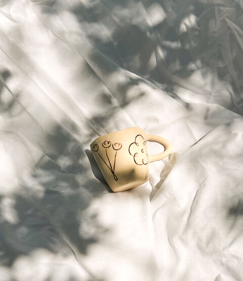 Чашка з квітками