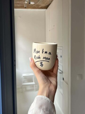 Glass "Mom I’m a rich man"