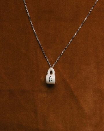 Ceramic micro pendant "Smile" on chain
